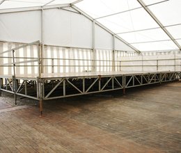 Bühne von 4,00 x 2,00 m bis 20,00 x 8,00 m mit Stiege und Geländer, höhenverstellbar von 60 - 120 cm